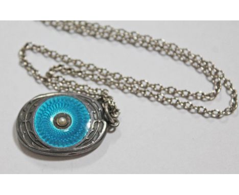 An Art Deco hallmarked silver and enamel locket pendant by William Hair Haseler, length 3cm, on white metal chain, unmarked, 