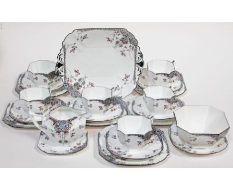 A Shelley 23 piece Queen Anne part tea set in "Black Leafy Tree" pattern, number 11575. Condition - one saucer doesn't quite 