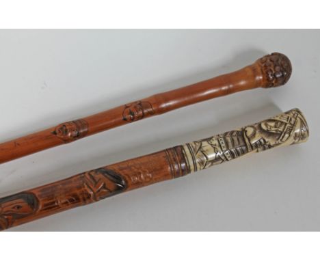 Two Japanese walking canes, one with carve bone handle, length 87cm & 89cm.Condition:  Minor splits near base on the stick wi