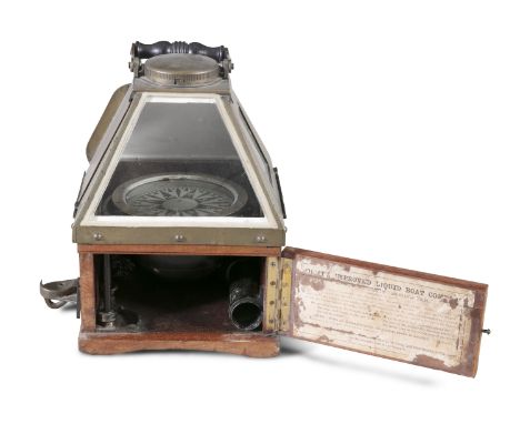 A 19TH CENTURY ROYAL NAVY OAK FRAMED BRASS BINNACLE COMPASS, 'Dent's Improved Liquid Boat Compass' having hinged ebon handle 