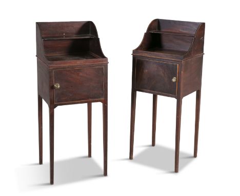 A PAIR OF GEORGE III MAHOGANY BEDSIDE LOCKERS, with raised shelf backs above single panel hinge doors, raised on square taper