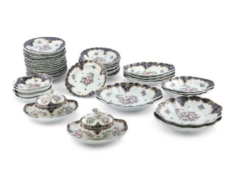 A CHAMBERLAIN’S WORCESTER PART DESSERT SERVICE, 18th Century, marked with underglaze in blue, each piece painted with fruit i