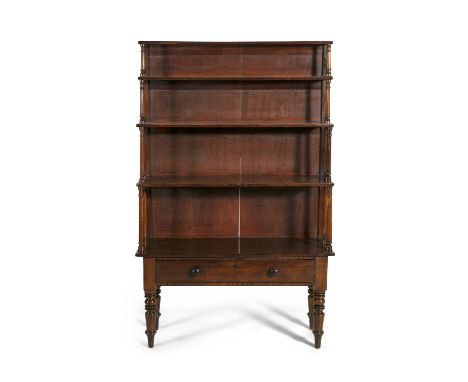 A GEORGE IV MAHOGANY GRADUATED BOOK SHELF, the four shelves with turned supports, above single frieze drawer, raised on turne