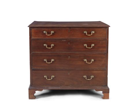 A GEORGE III MAHOGANY CHEST OF DRAWERS, the rectangular top above four long cockbeaded drawers, with brass drop handles, rais