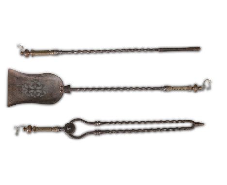 A SET OF THREE VICTORIAN FIRE STEELS, each with brass handles decorated with Greek ornament, and knobbed finial, barley twist