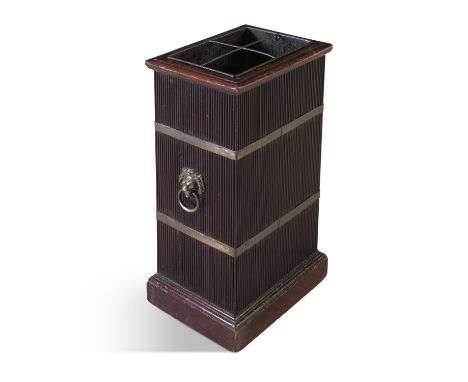 A MAHOGANY BRASS BOUND UMBRELLA/STICK STAND IN THE REGENCY STYLE, of rectangular form, with compartmented zinc liner, with ap