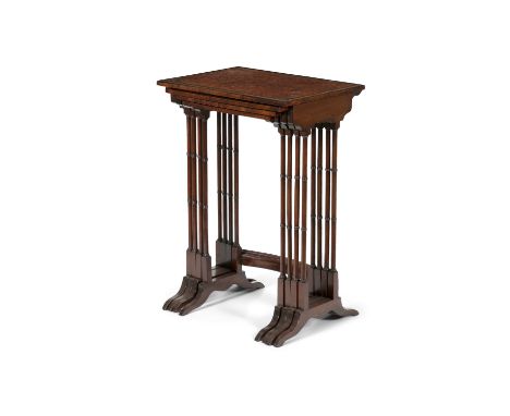 A NEST OF AMBOYNA WOOD QUARTETTO TABLES, 19th century, of graduated rectangular size, on ring turned columns raised on tresse