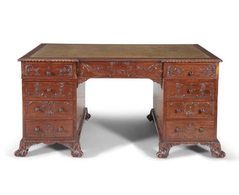 A FINE GEORGE III MAHOGANY RECTANGULAR TWIN PEDESTAL DESK, in the Chinese Chippendale taste, the gilt tooled green leather sc