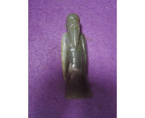 A Jade nephrite stone carved figure of a Chinese man standing 14cm high