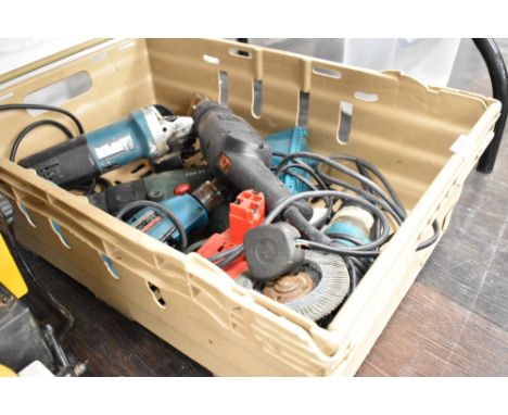 A selection of Makita and similar power tools including angle grinder and drill etc