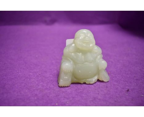 A Chinese Jade or nephrite figure of a seated Buddha 2inch high