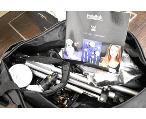 A professional Portaflash photography light with case etc