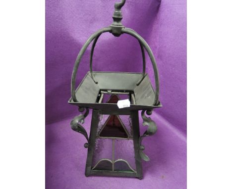 An arts and crafts lantern or light fitment having leaded light panels with painted metal and copper body
&nbsp;
Damage to on