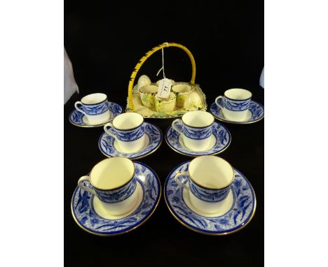 A set of six late Foley Shelley blue and white coffee cans and saucers, each decorated with birds in flight and having a gilt