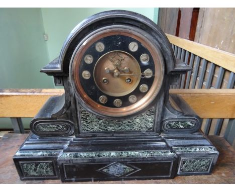 A large Victorian and slate mantle clock, having domed top over stepped rectangular base, the dial bearing Roman numerals (AF