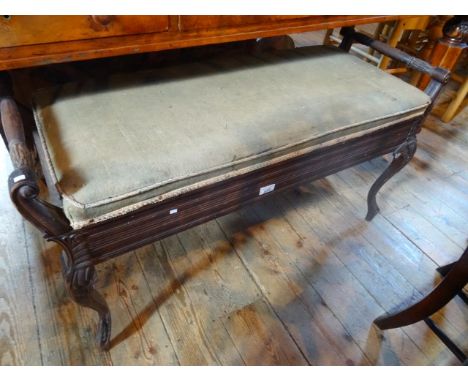 A 19th century mahogany duet stool, having upholstered seat over four cabriole supports, 95cm.