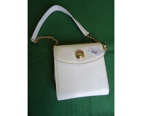 A ladies Chloe small white leather handbag, having internal integral mirror accessory, with magnetic clasp closing and gilt m