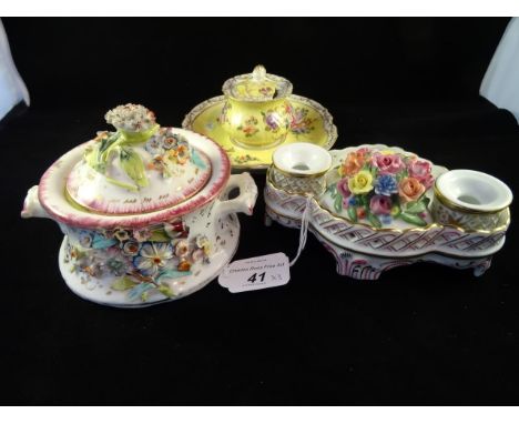 A late 18th century hand painted Dresden inkwell on associated stand, having floral spray decoration on yellow ground with gi