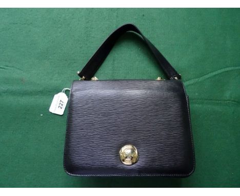 A ladies Chloe small black leather handbag, having internal zipped pocket and integral mirror accessory,  magnetic clasp clos