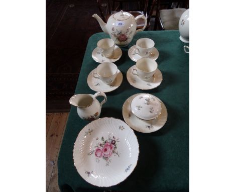 A Royal Copenhagen Frijsenborg part-tea service, comprising: teapot, four cups and saucers, cream jug, covered sugar bowl and