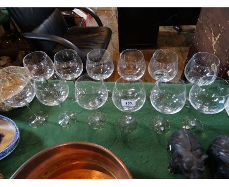 A set of twelve Orrefors wine glasses, 20cm tall.