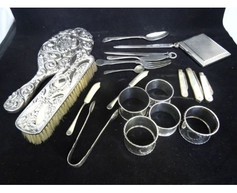 A mixed lot of silver and silver plate, to include: a silver backed hand mirror and dressing table brush, a cigarette case wi