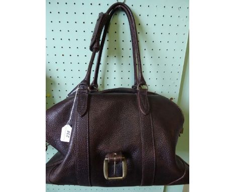 A ladies brown leather J & M Davidson handbag, having cotton lined interior with single zipped pocket, zipped closure with pa