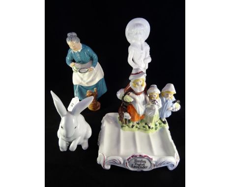 A Royal Doulton figure 'The Favourite' HN2249, together with a Lladro 'Sitting Bunny' figure no. 5907 (with original box), a 