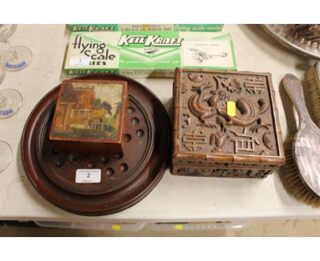 A mahogany solitaire board; a Chinese dragon decorated trinket box and one other trinket box   