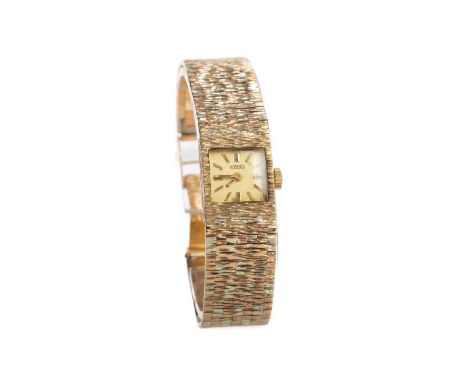LADY'S ROAMER NINE CARAT GOLD MANUAL WIND WRIST WATCH,the square champagne dial with applied baton hour markers, 14mm case, t