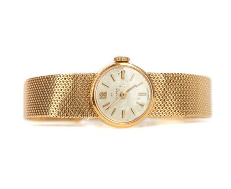 LADY'S CYMA EIGHTEEN CARAT GOLD CASED MANUAL WIND WRIST WATCH,the round cream dial with applied baton hour markers, 17mm case