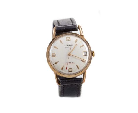 GENTLEMAN'S MAJEX NINE CARAT GOLD MANUAL WIND WRIST WATCH,the round cream dial with applied baton and Arabic hour markers, ou