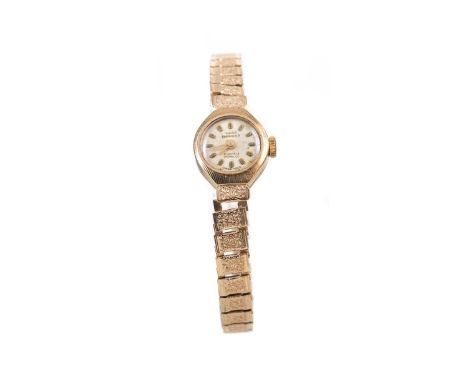 LADY'S SWISS EMPRESS NINE CARAT GOLD MANUAL WIND WRIST WATCH,the round cream dial with applied baton hour markers, 14mm case,
