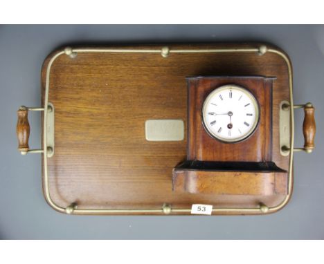 A 1920's oak and brass tea tray together with a 1920's mantel clock.