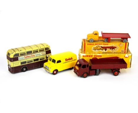 Two boxed Dinky die cast models with a Dinky route Master bus and a Corgi Bedford van.
