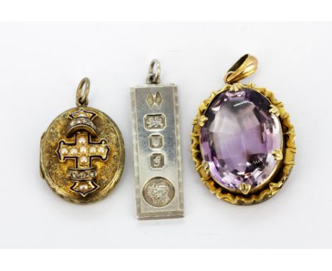 A gilt metal locket pendant decorated with enamel, split pearls and rose cut diamonds, a hallmarked silver ingot pendant and 