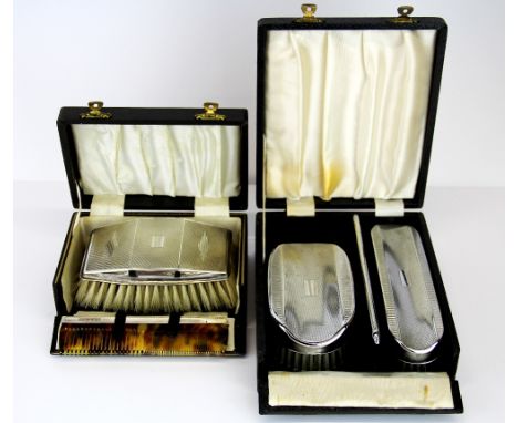 A gentlemen's hallmarked silver brush and comb together with a chromium plated gentlemen's set