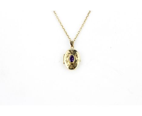 A 9ct yellow gold amethyst set locket pendant and chain, L. 1.8cm, approx. 3.3gr.&nbsp;
