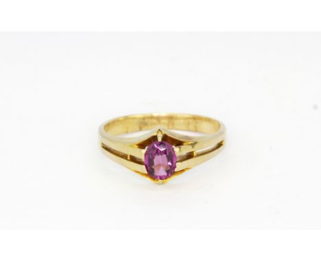 A yellow metal (tested 9ct gold) amethyst set ring, (P.5).