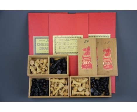 Three boxed Staunton wood chess sets and boards.