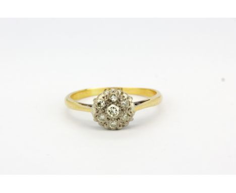 An18ct yellow gold (stamped 18ct) diamond set cluster ring, (K).