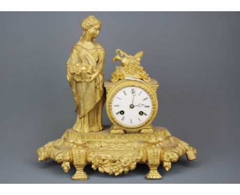 A 19th C French gilt spelter mantel clock, H.32cm. Condition: without bell or pendulum.