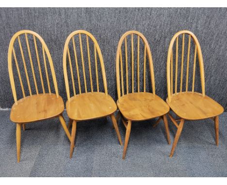 A set of four vintage high back Ercol style kitchen chairs, one A/F.