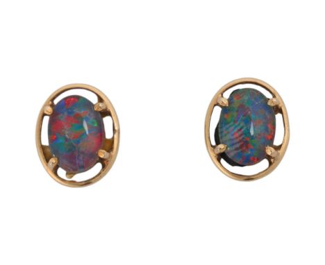 A pair of 14ct gold black opal triplet stud earrings, unmarked mount tests as 14ct, 9.6mm, 1.6g . Condition Report:No damage,