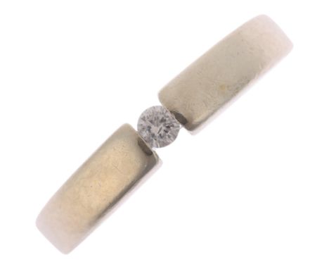 A 9ct white gold 0.05ct single stone diamond ring, channel set with modern round brilliant-cut diamond, setting height 3.7mm,