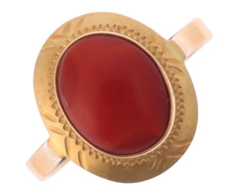 An Italian 18ct gold coral dress ring, setting height 14mm, size N, 3.1g . Condition Report:No damage or repair, only general