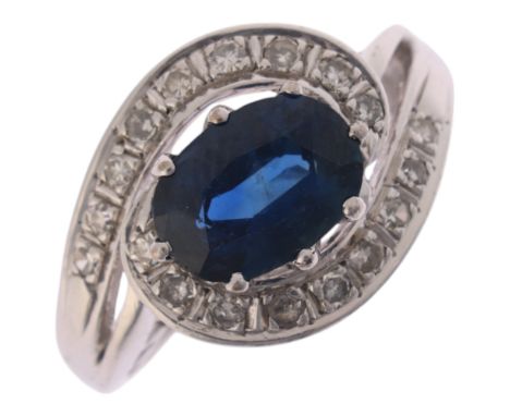 An 18ct white gold sapphire and diamond tourbillon cluster ring, set with oval mixed-cut sapphire and single-cut diamonds, se