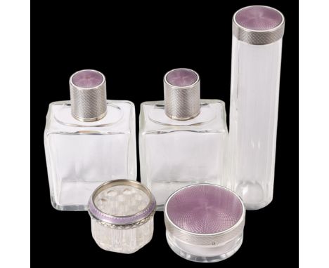An Art Deco French silver and lilac enamel 5-piece travelling dressing table set, circa 1920, including powder and toilet jar