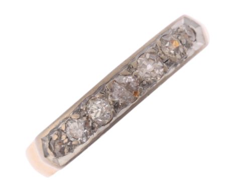 An 18ct gold seven stone diamond half eternity ring, platinum-topped set with old-cut diamonds, total diamond content approx 