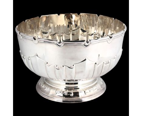 An Edwardian silver pedestal fruit bowl, Harrison Brothers & Howson, London 1907, circular form, with scalloped rim and relie